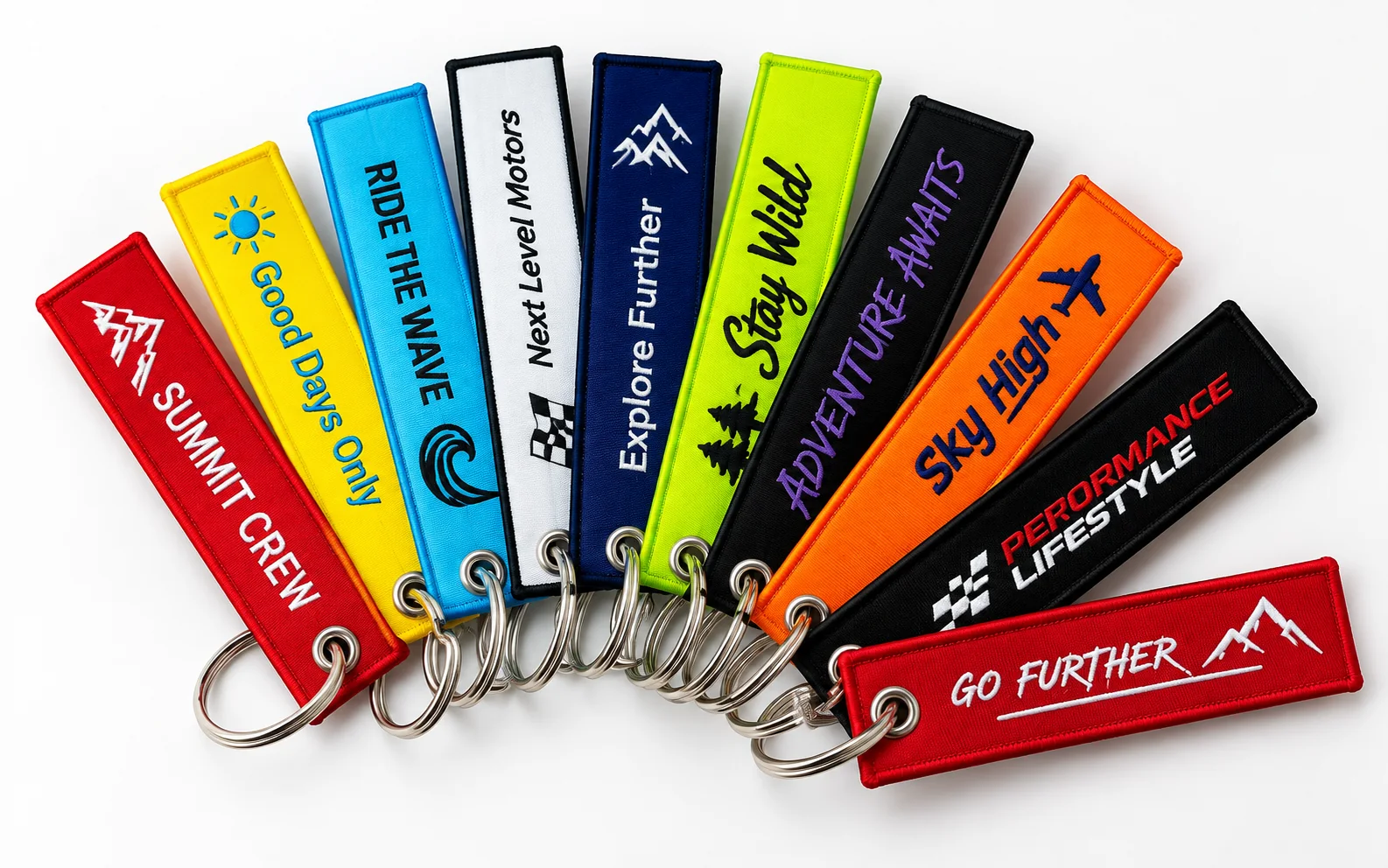 Custom fabric keychains with woven and embroidered designs