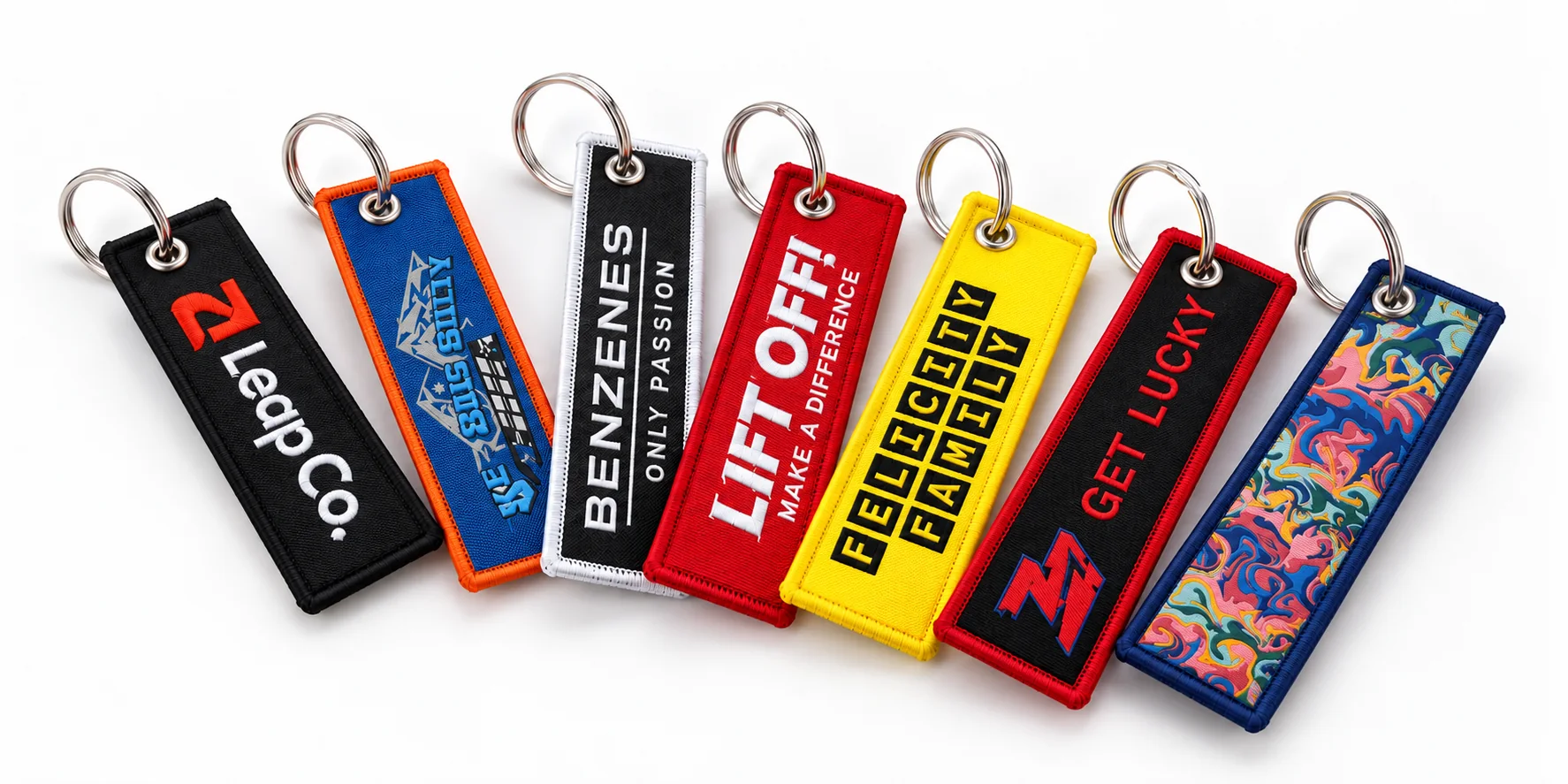 Custom fabric keychains in multiple colors and logo styles