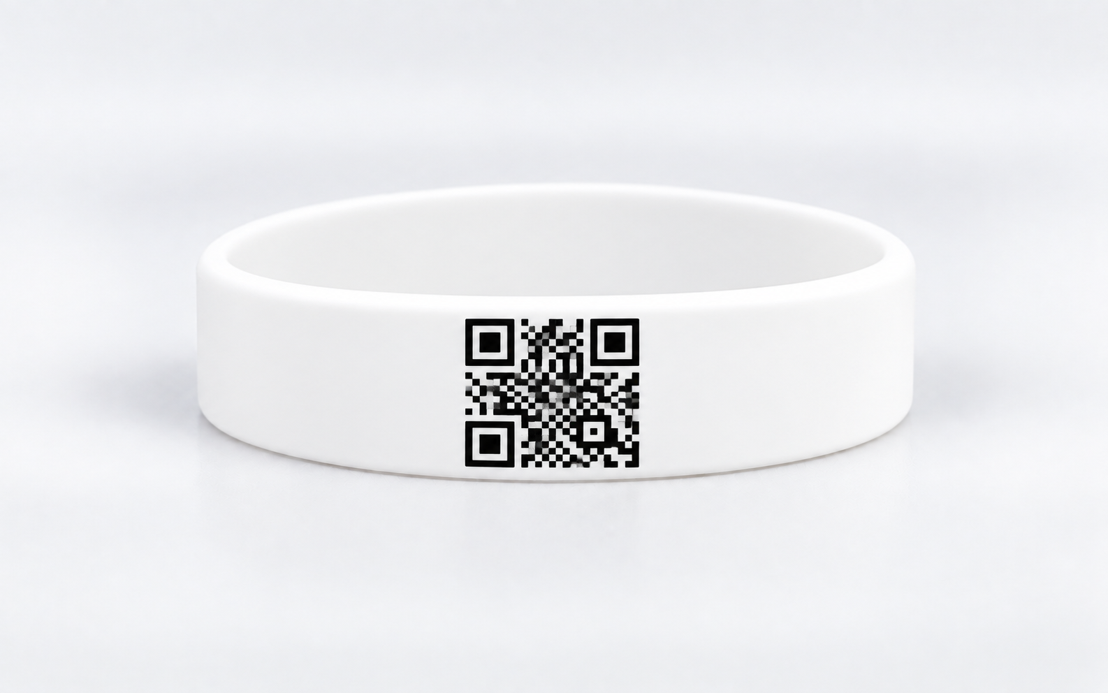 White silicone wristband printed with a QR code